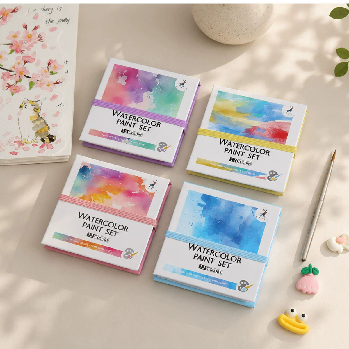 Four watercolor paint set cover styles